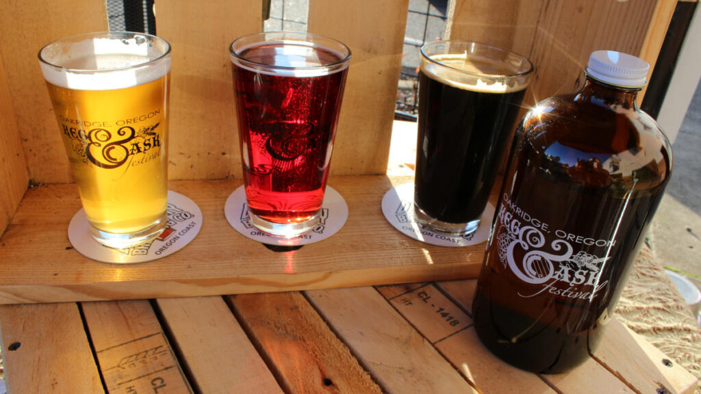 Oakridge, Oregon Keg & Cask Festival: 3 beer samples on coasters and bottle