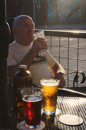 Oakridge, Oregon Keg & Cask Festival: volunteer drinking a glass of beer