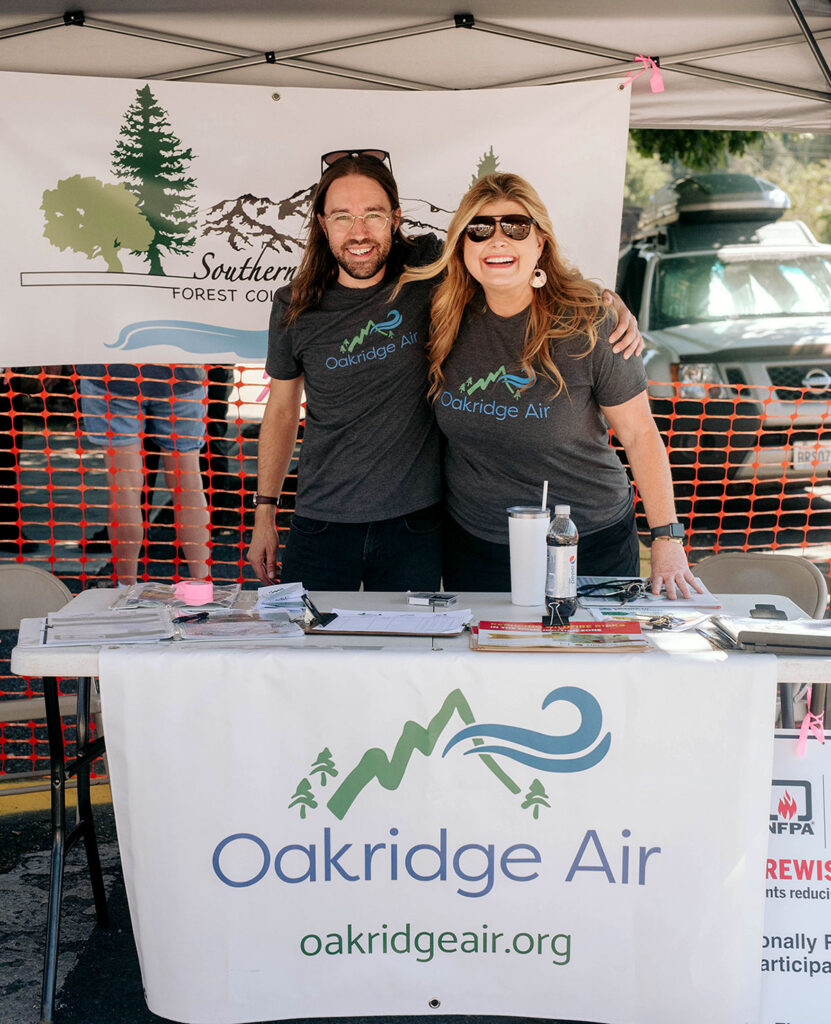 Oakridge Oregon Keg & Cask Festival: non-profit booth with smiling staff